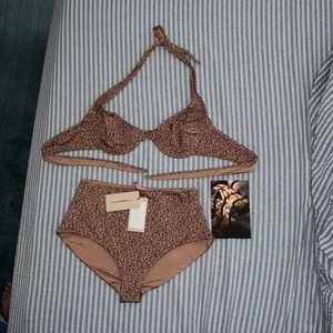 Brand is Morebeachwear. Size top and bottom is 42 top (L) and 40 bottom (M).